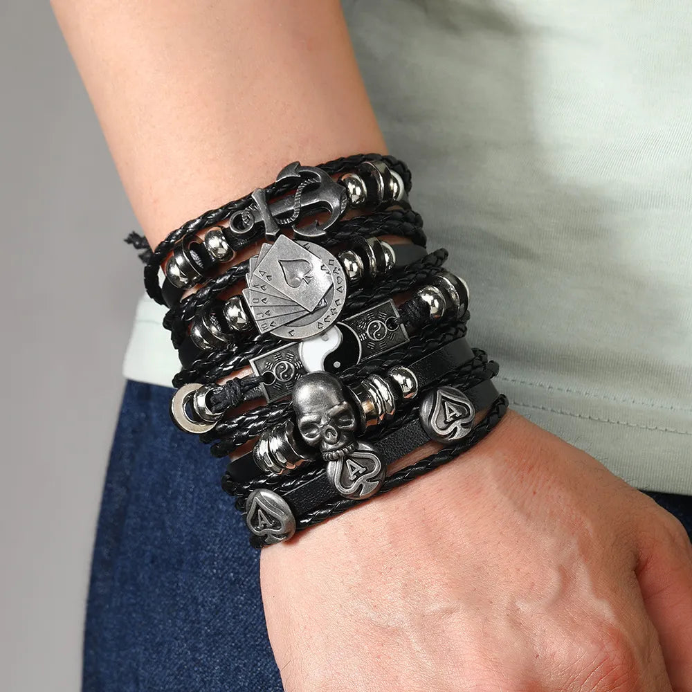Forge Your Style with Black Skull Multi-layer Bracelet Set for Men!